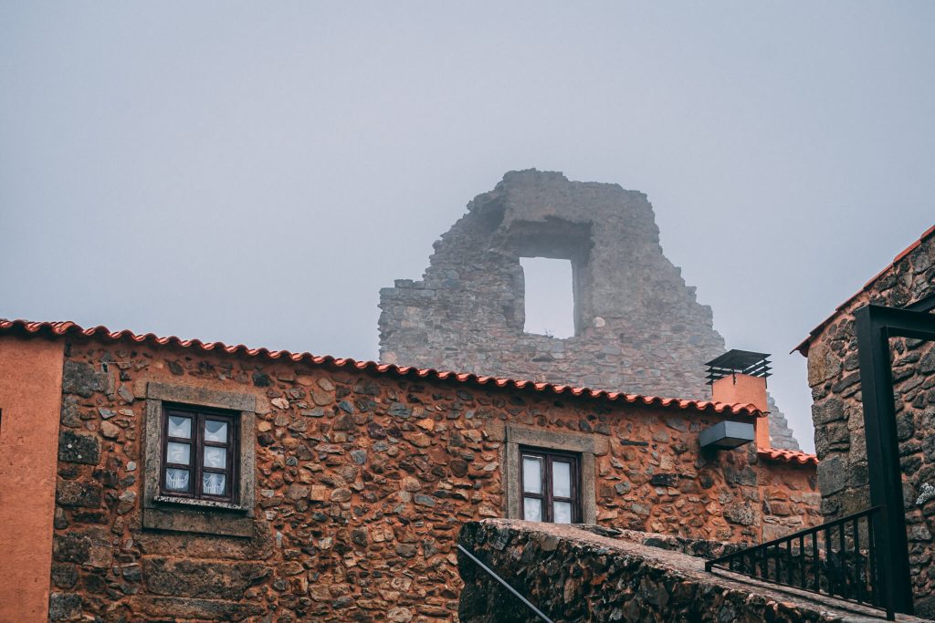misty-ruins-above-schist-village-castelo-rodrigo-portugal