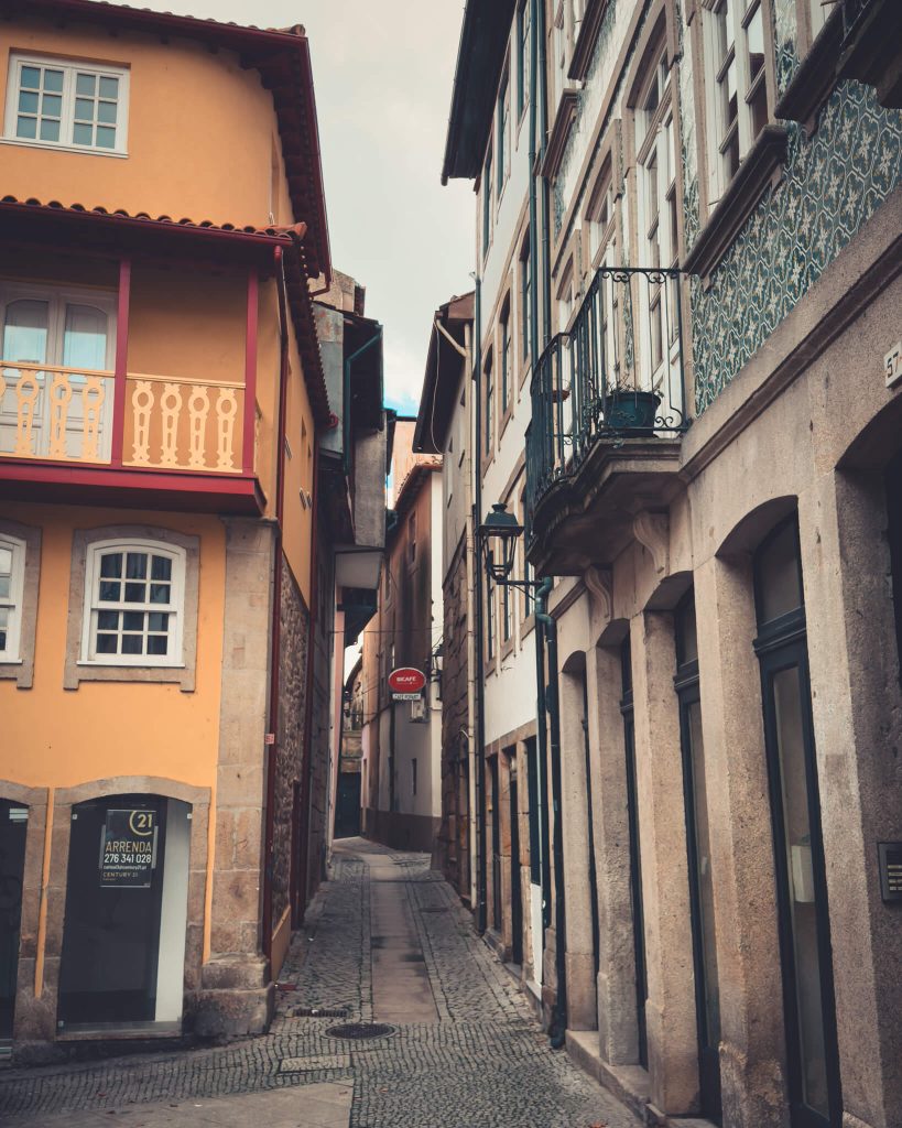 narrow-alley-with-colorful-houses-chaves-historic-center-portugal