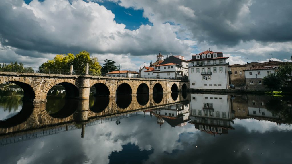 roman-bridge-reflection-over-tamega-river-chaves-portugal