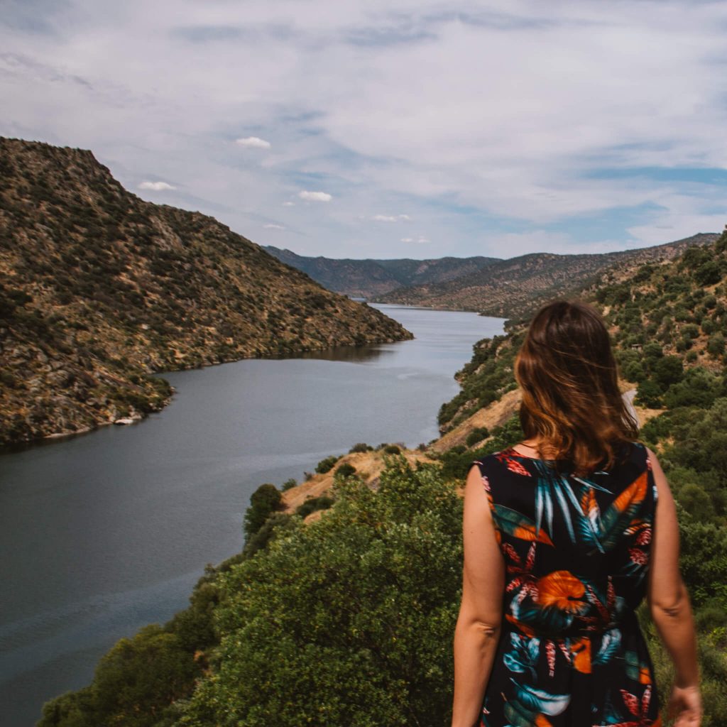woman-looking-arribes-del-duero-river-cliffs-spain